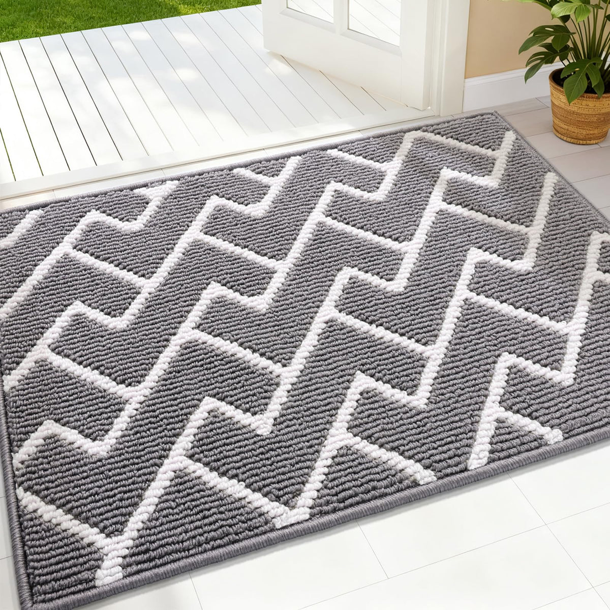 OLANLY front door mat with geometric pattern traps dirt at the doorstep.