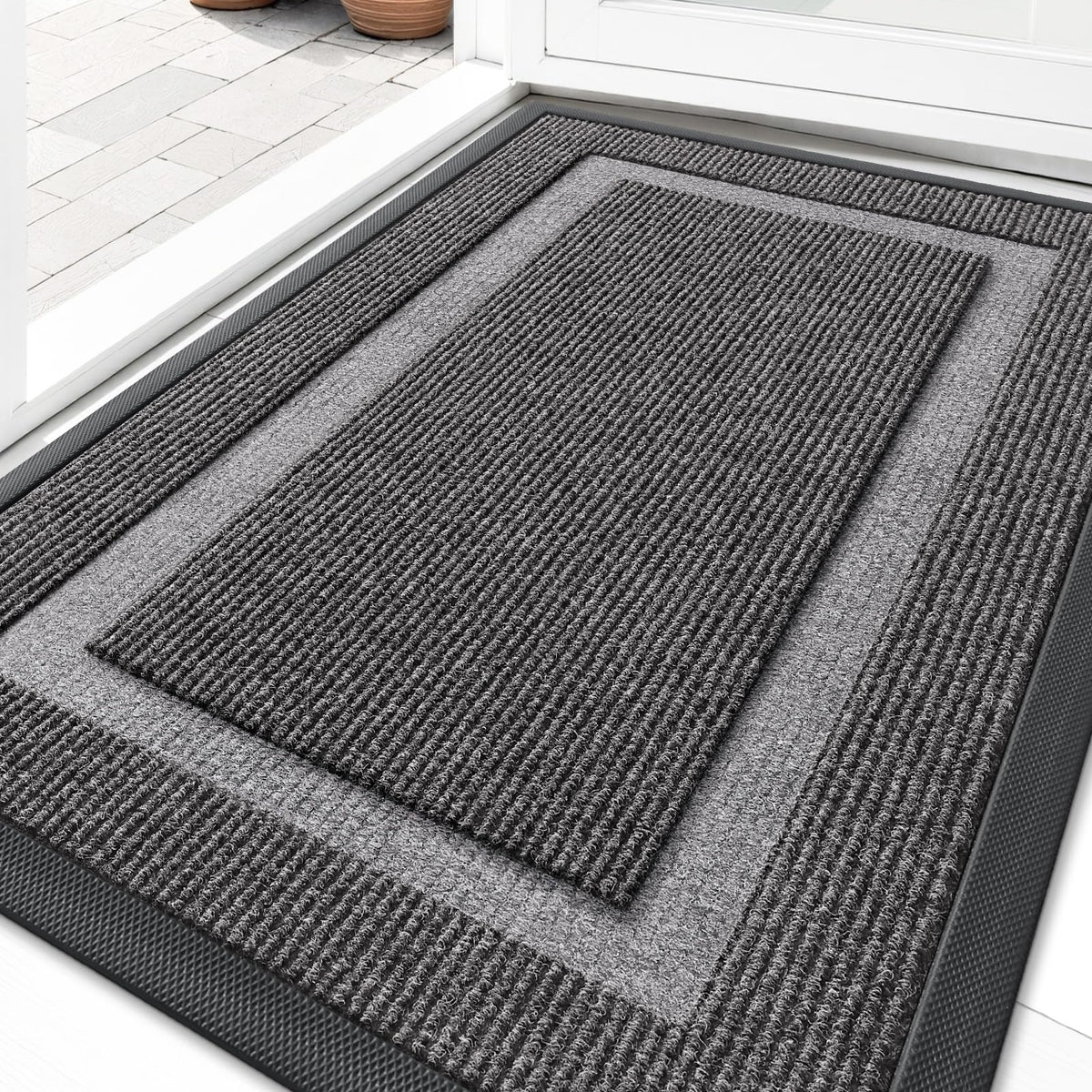 OLANLY front door mat with natural rubber backing traps dirt at the entry.