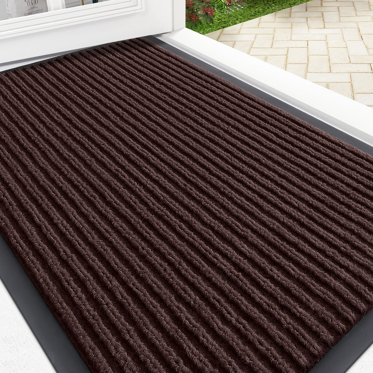 OLANLY front door mat with a stripe pattern traps dirt and welcomes guests