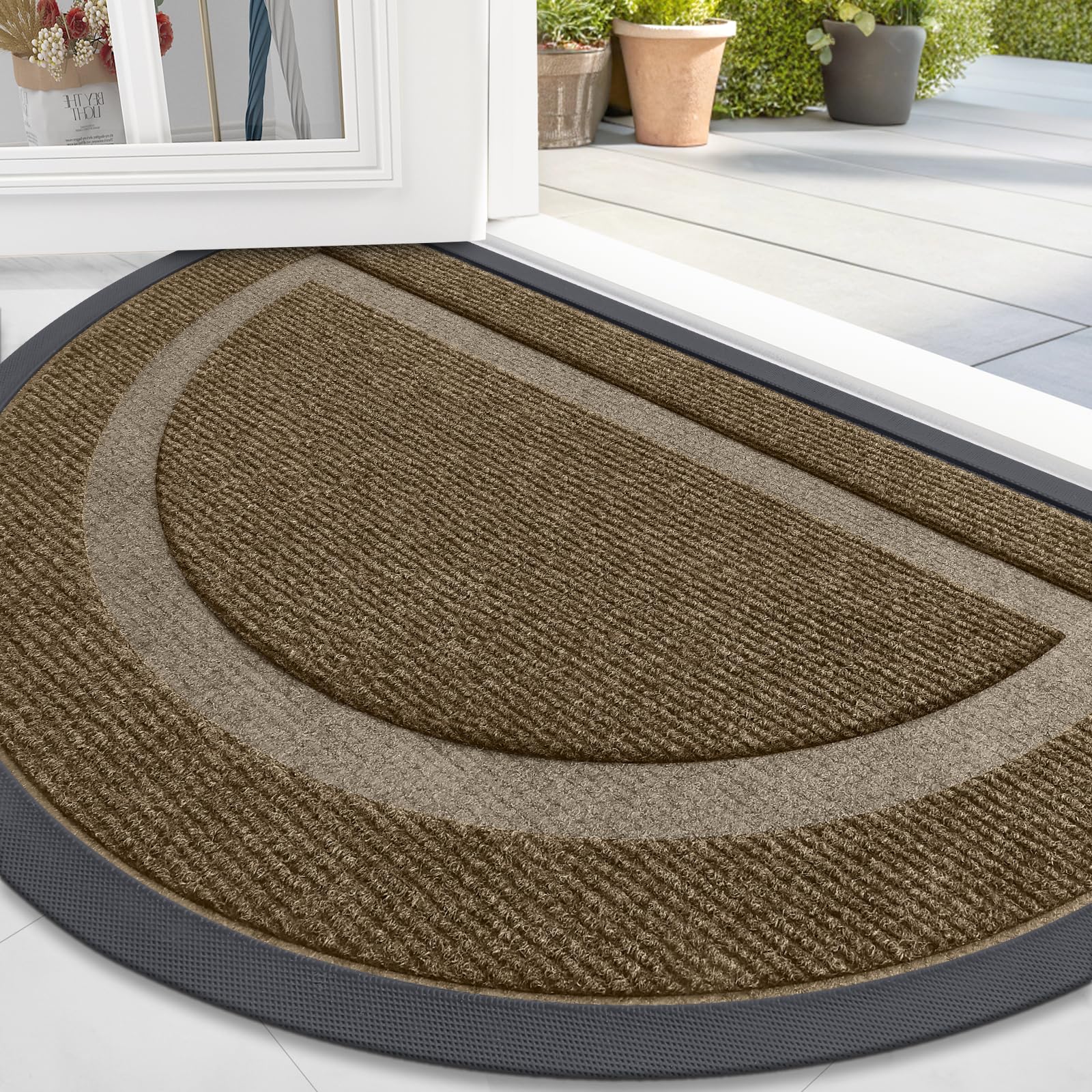 OLANLY half-circle door mat in brown with low profile at entry.