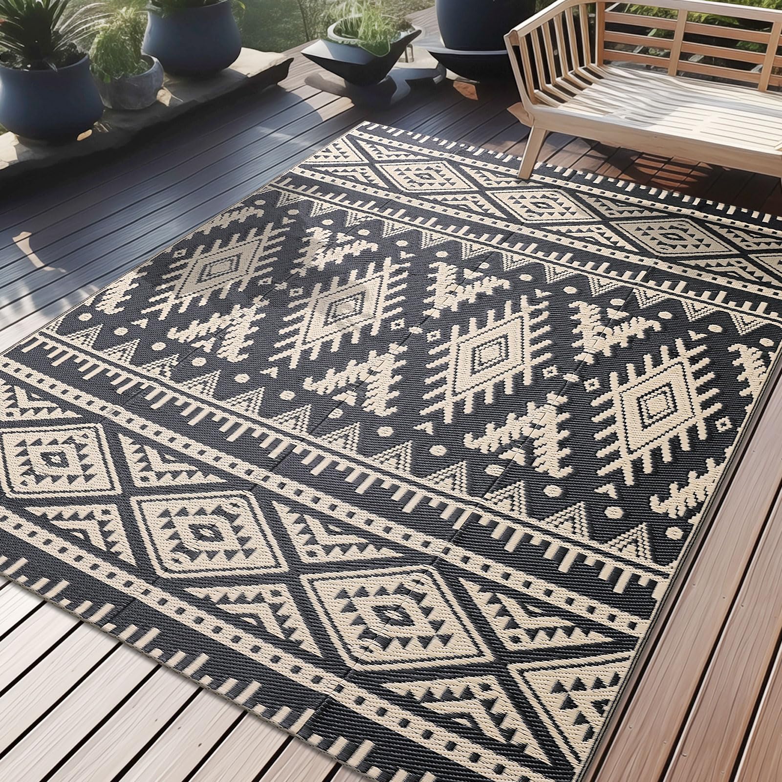 OLANLY outdoor rug 5x8 in black and beige adds cozy style and quick-dry practicality to patios.