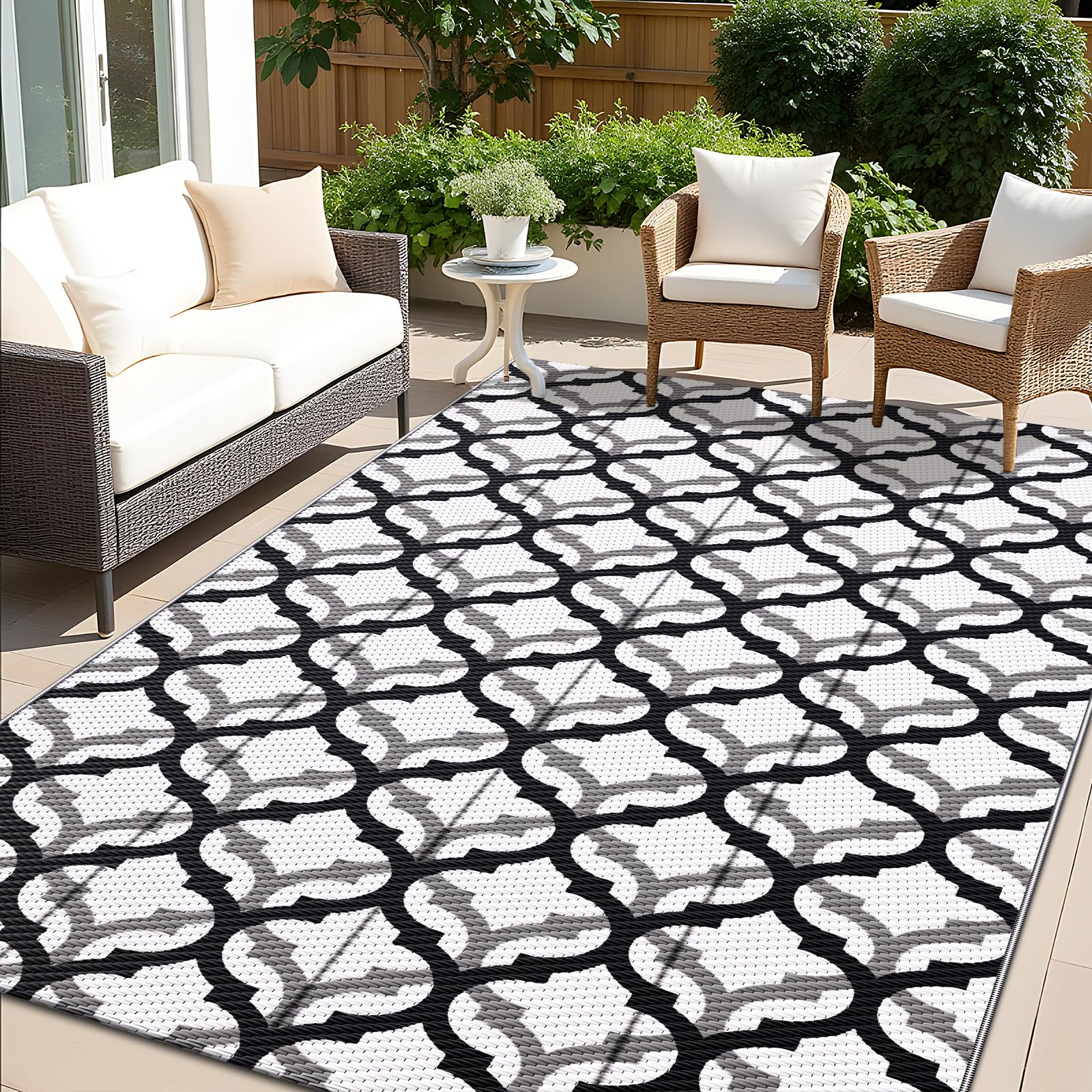 OLANLY reversible outdoor rug with interlacing pattern adds stylish comfort to patios.