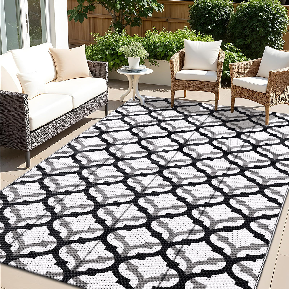 OLANLY reversible outdoor rug with interlacing pattern adds stylish comfort to patios.
