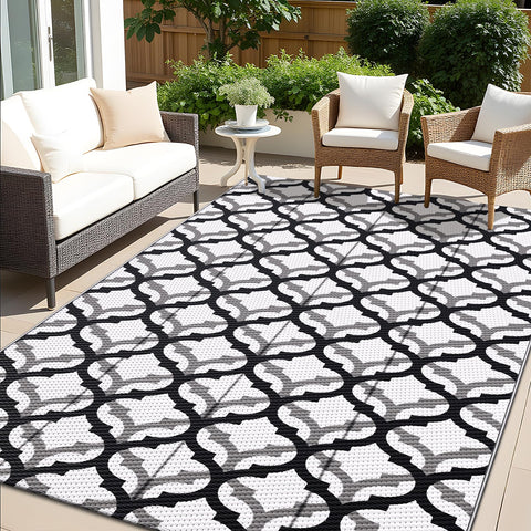 OLANLY reversible outdoor rug with interlacing pattern adds stylish comfort to patios.