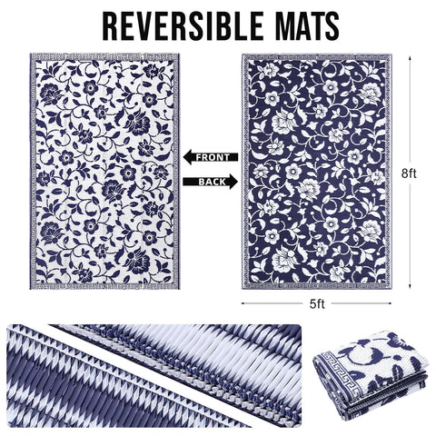 OLANLY reversible patio rug shows navy-white florals for adaptable styling.