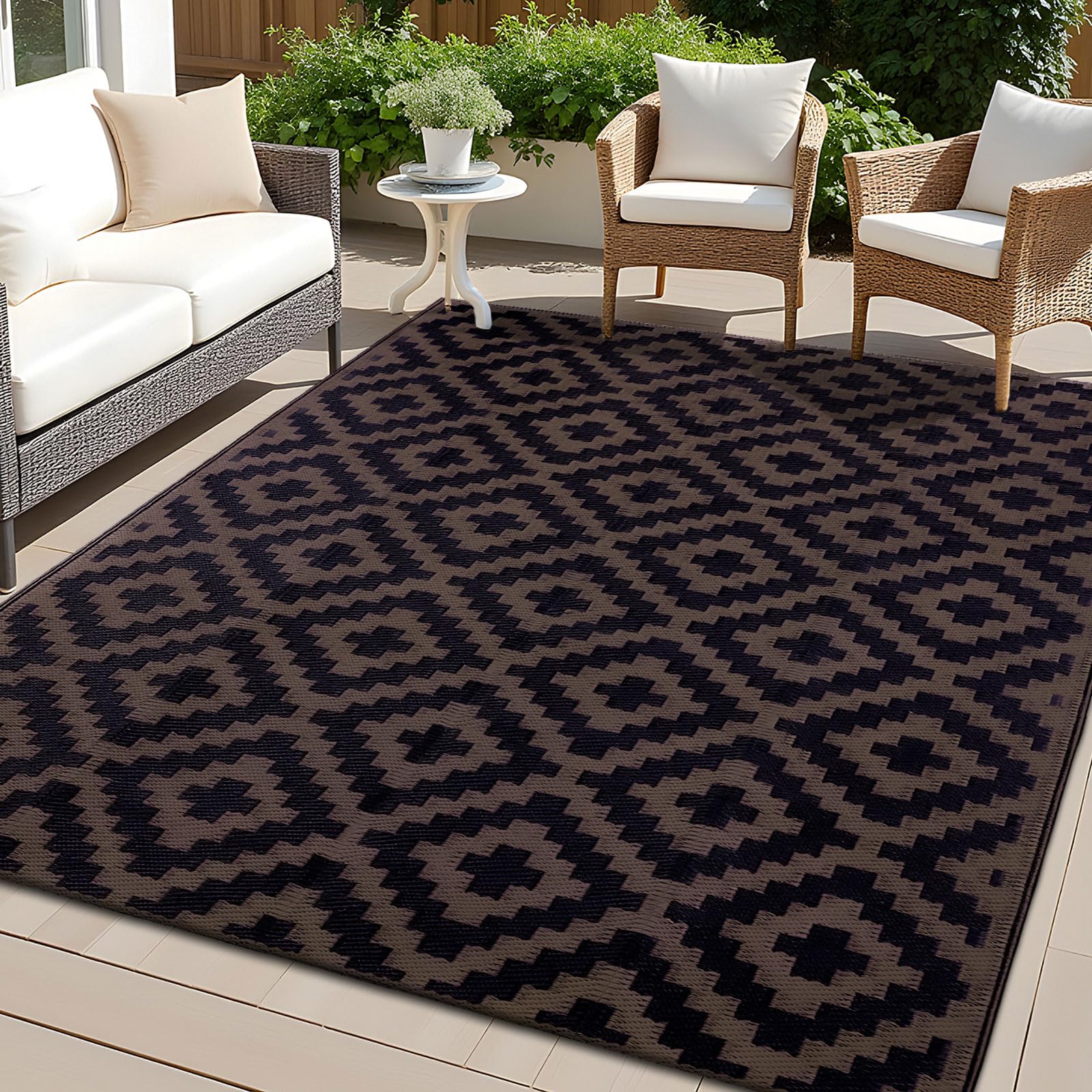 OLANLY waterproof outdoor rug in black and brown with reversible geometric pattern for versatile decor.