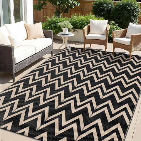 OLANLY waterproof outdoor rug 5x8 ft in black and beige on patio, ideal for decks and balconies.