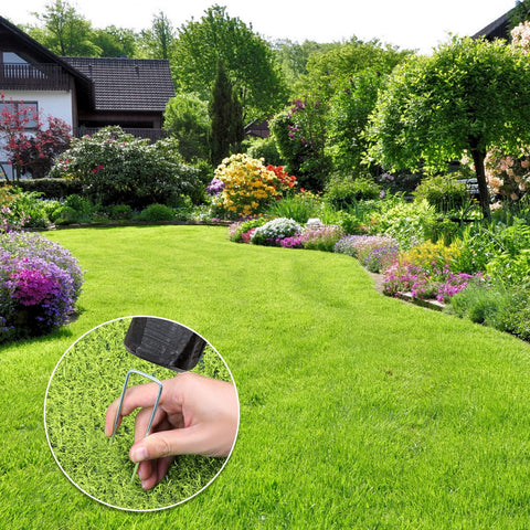 Oligei landscape staple anchoring netting, fencing, and turf.