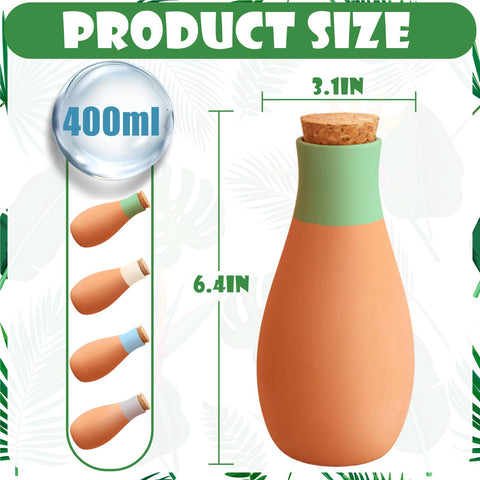 Ollas self-watering globes inserted into soil for controlled moisture