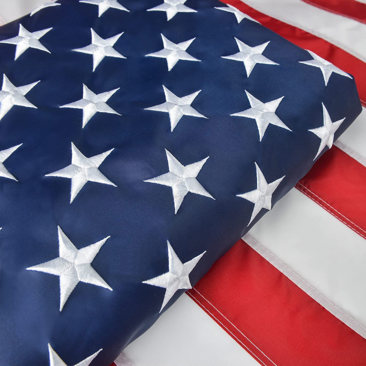 Olycole American Flag 5x8 ft with embroidered stars for premium outdoor display.