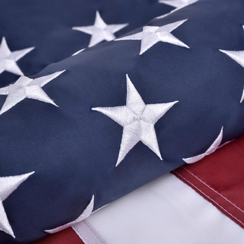 Olynese American Flag with embroidered stars for outdoor display.