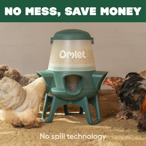 Omlet No Waste Feeder side hanging demonstrates easy mounting in outdoor runs.