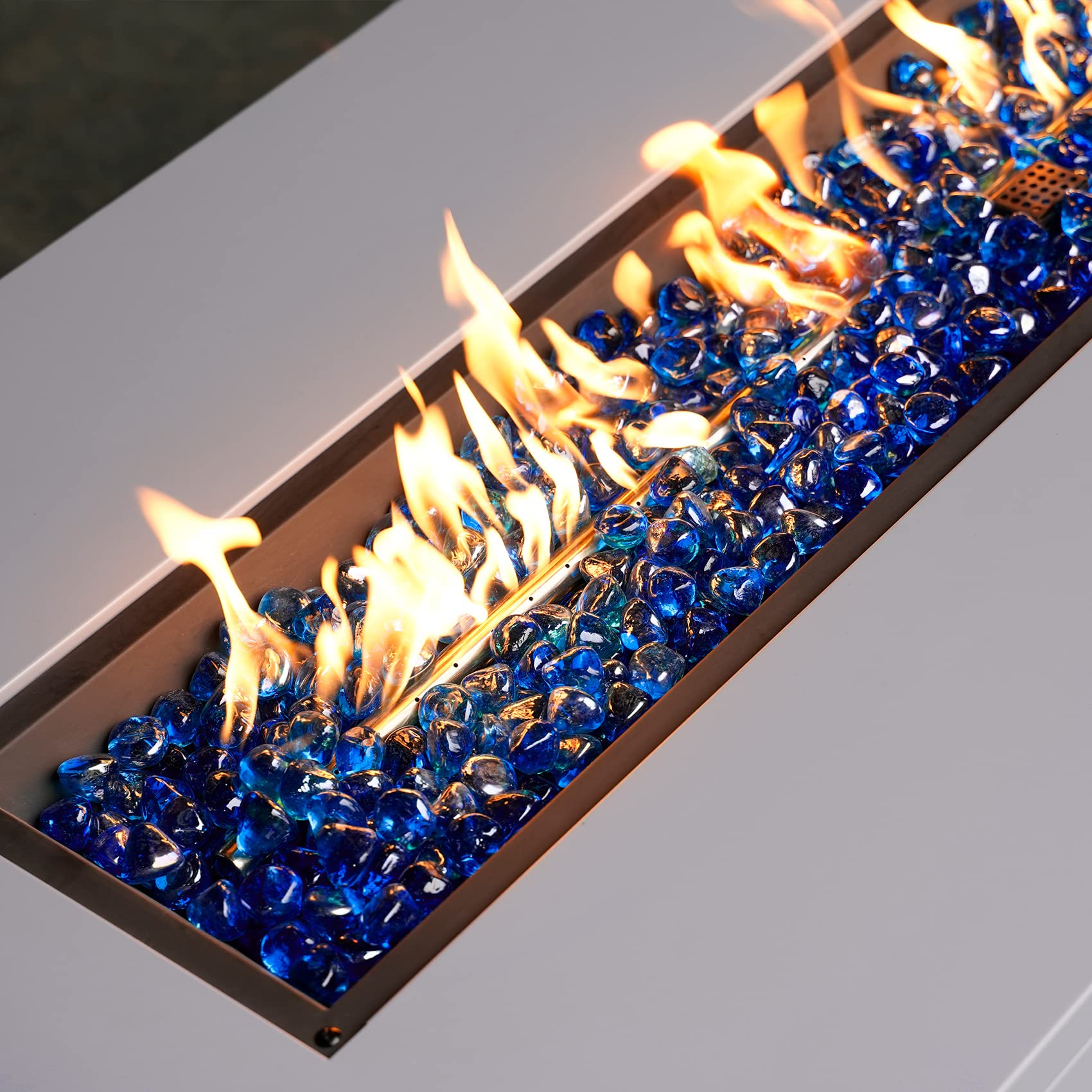 Onlyfire cobalt blue fire glass diamonds decorate gardens and water features with elegance