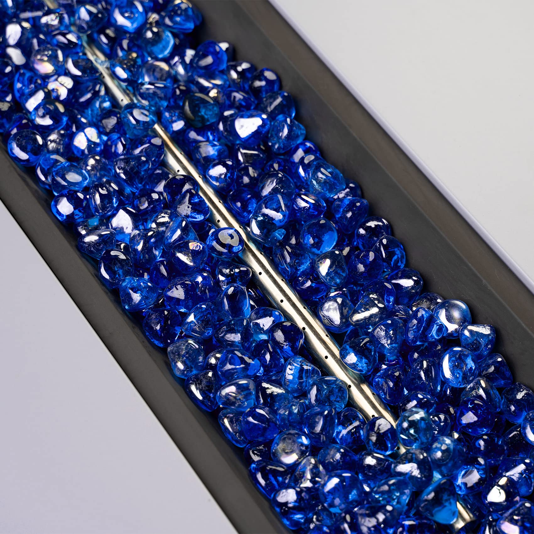 Onlyfire cobalt blue fire glass diamonds in indoor fireplace create cozy jewel-like glow