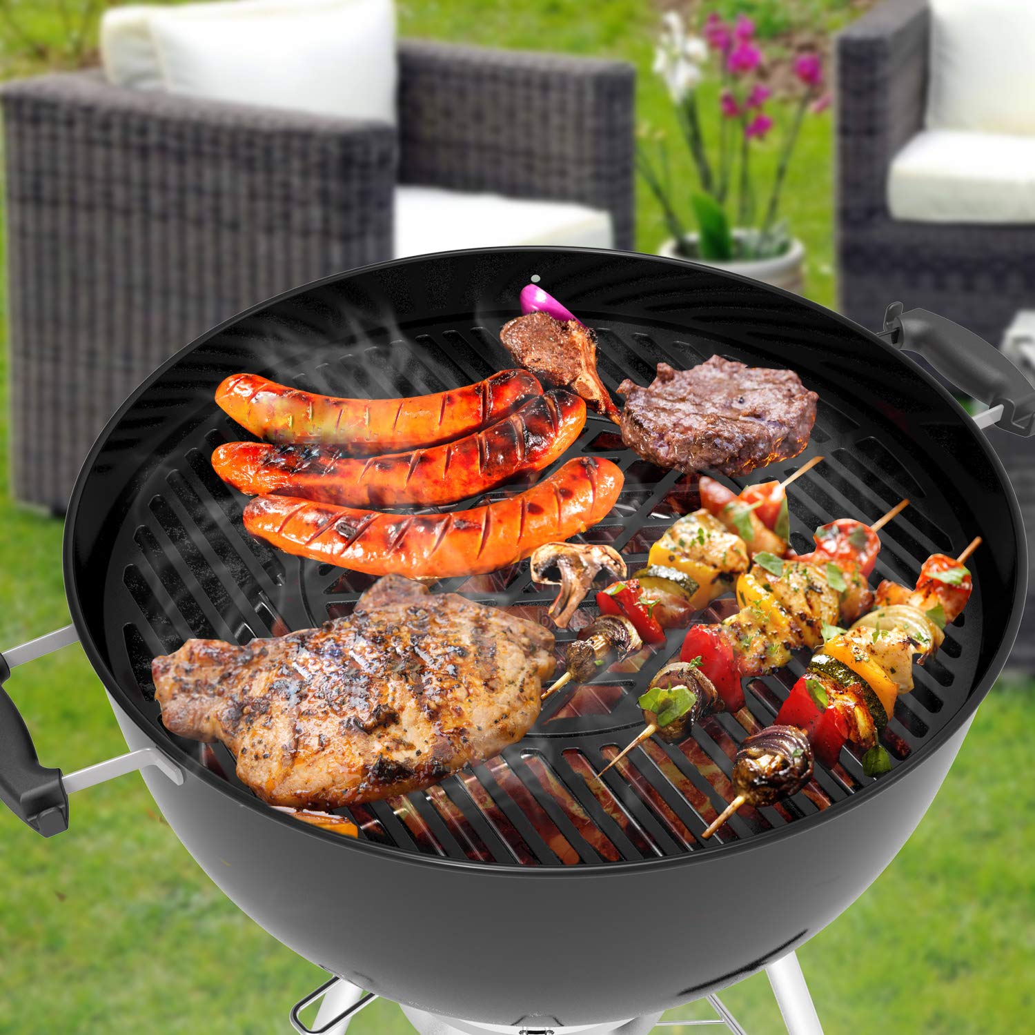 Inner sear grate with raised side handles for quick charcoal additions.