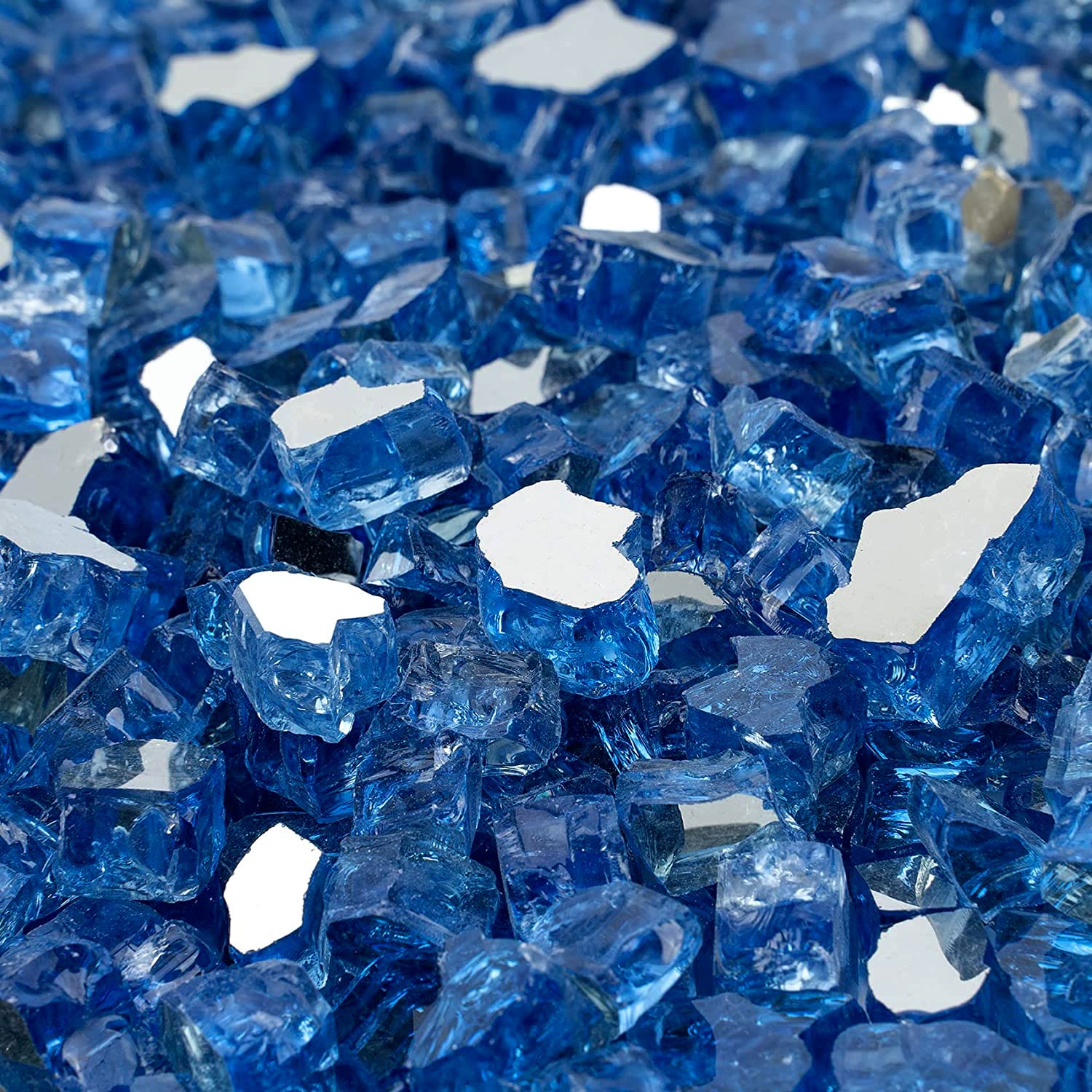 Onlyfire reflective fire glass sparkles in sunlight for outdoor pits.