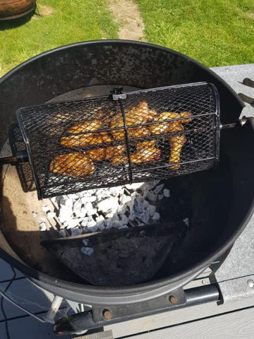 Onlyfire rotisserie basket with vegetables for even caramelization