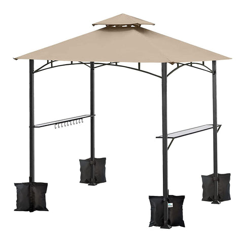 Ontheway sand bags in use with a pop-up canopy at a park.