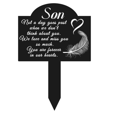 OOOCT memorial grave stake with heart and feather plaque outdoors for remembrance