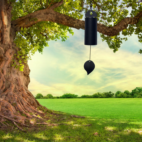 OOYAYA serenity bell outdoor decor in black adds subtle serenity.