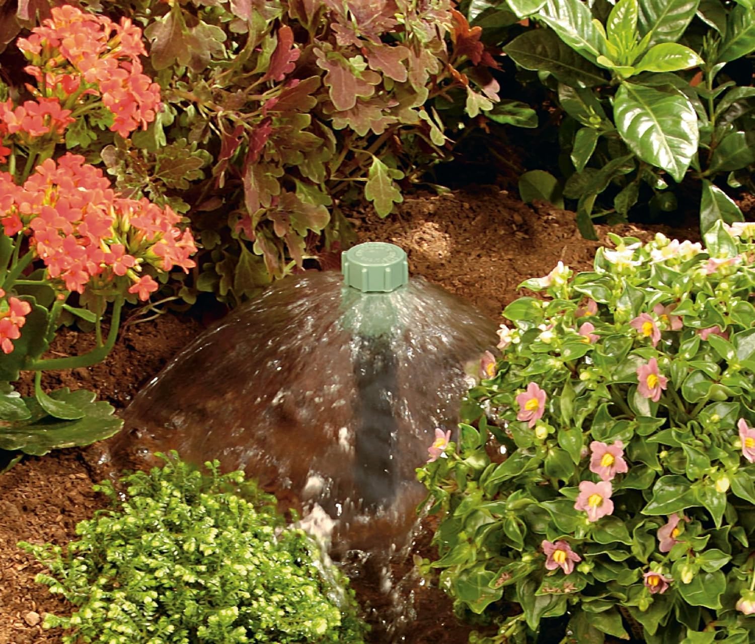 Orbit 54042 Bubbler installed in garden bed near roots.