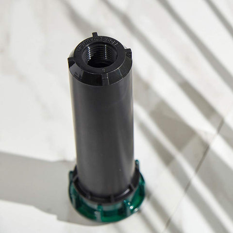 Orbit 54500 durable metal cap protection, shielding the sprinkler from equipment damage.