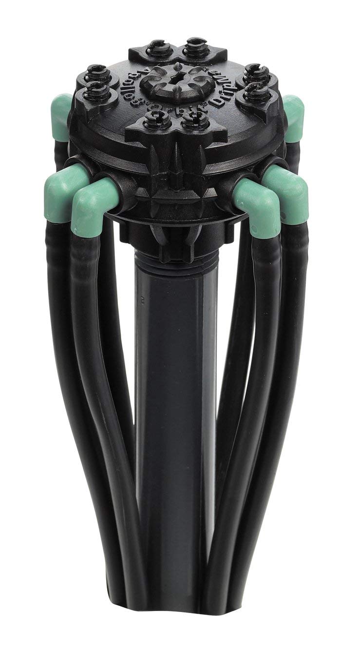 Orbit adjustable flow 8-port manifold garden installation demonstrates scalable watering across beds and pots.