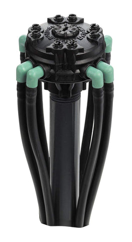 Orbit adjustable flow 8-port manifold garden installation demonstrates scalable watering across beds and pots.