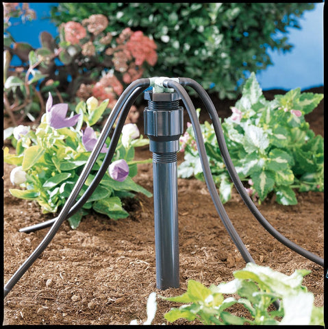 Orbit 1/4 inch tubing connected to manifold for precise plant watering