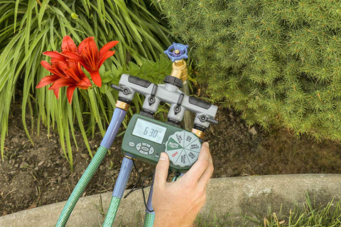 Orbit hose faucet timer dial closeup highlights intuitive controls and scheduling.