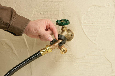 Orbit Outlet Splitter used for multiple watering tasks from one faucet.