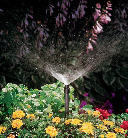 Orbit sprinkler head with flow adjustment and debris filter for reliable watering.