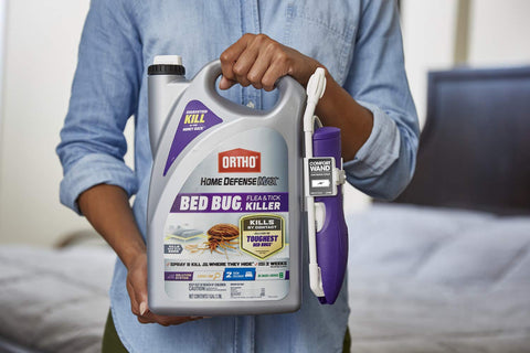Ortho Home Defense Max applied to mattress seams and folds for thorough coverage.