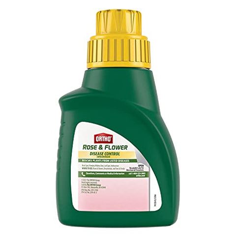 Ortho Rose & Flower concentrate spray applied to rose leaves for protection.
