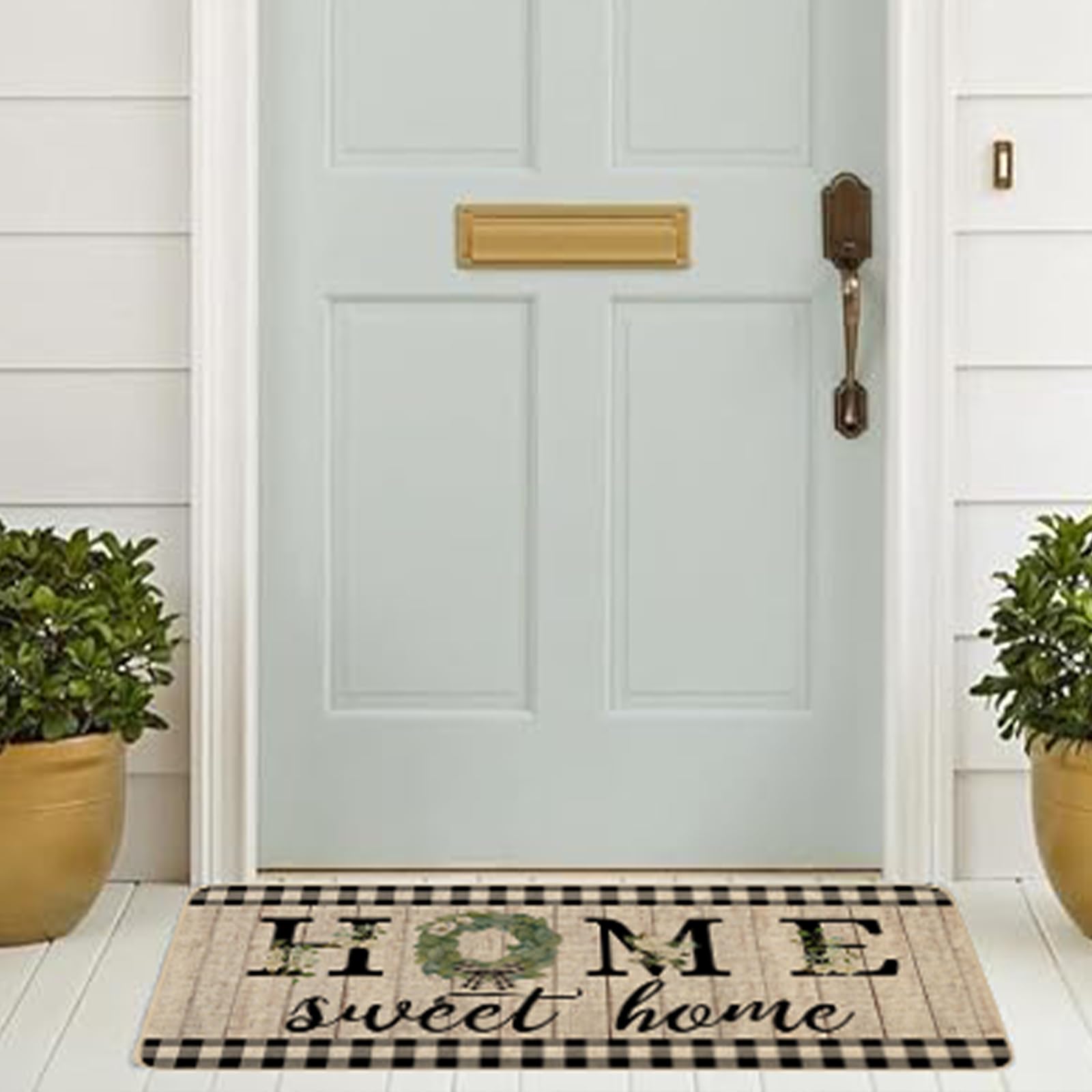 ORTIGIA all-season door mat withstands sun and rain across seasons.