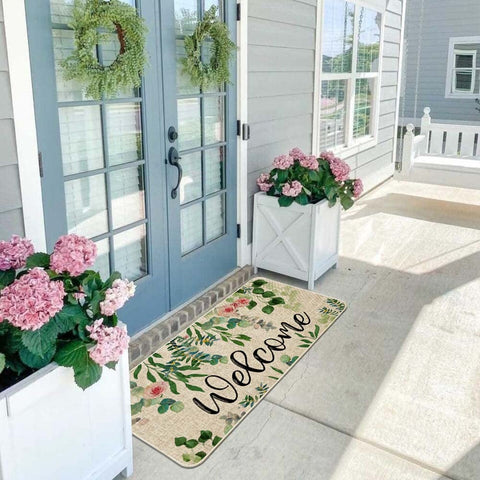 ORTIGIA Welcome doormat at outdoor entry for versatile use.