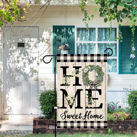 ORTIGIA Home Sweet Home Magnolia flag burlap texture close-up emphasizes rustic charm