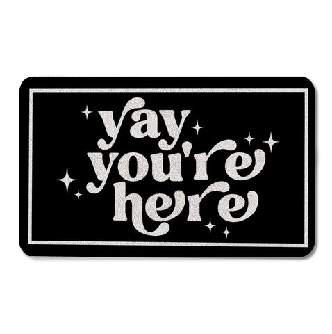 OSLYSOF Funny Black Door Mat with Yay You're Here design welcoming guests outdoors