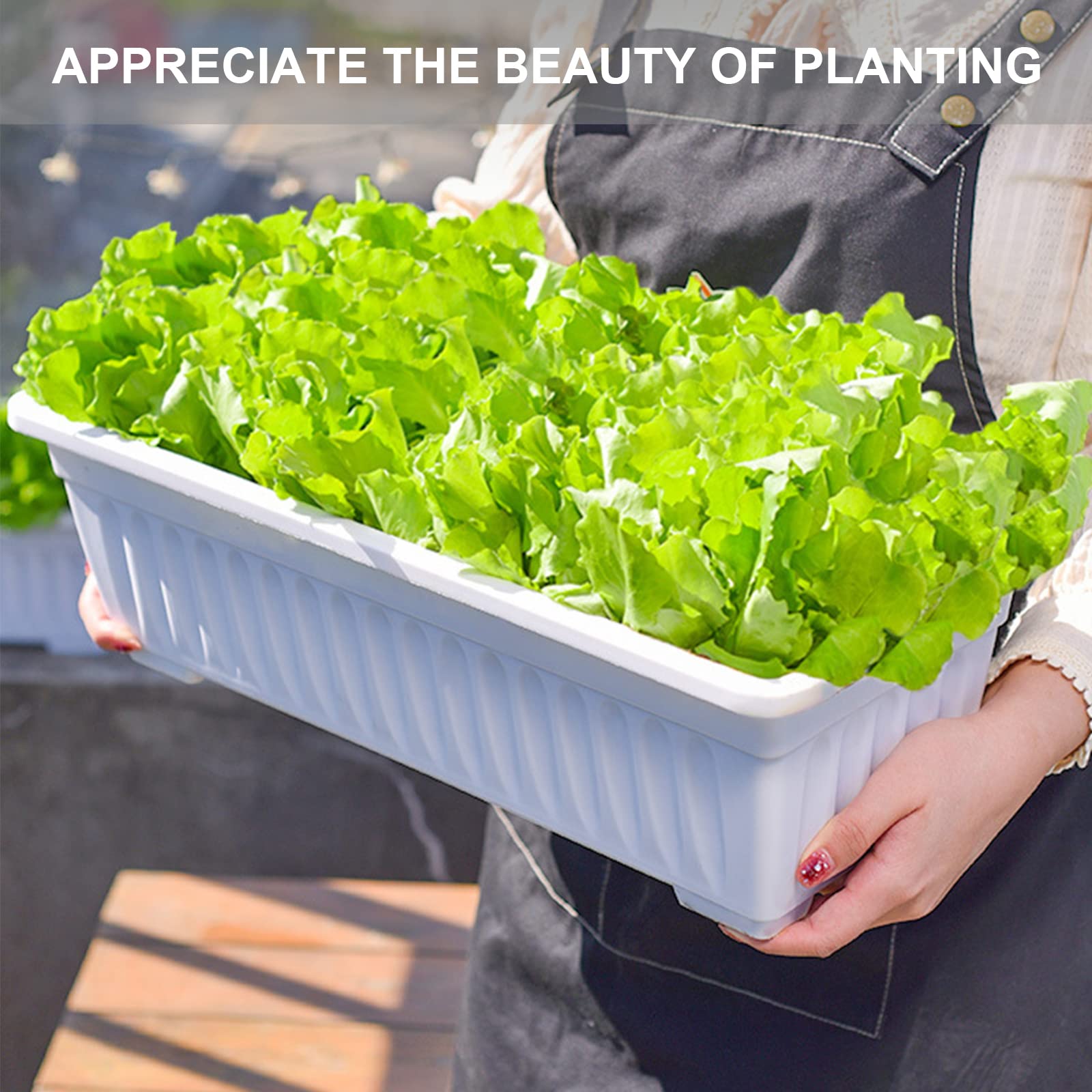 OSMOFUZE versatile planter on balcony for flowers and herbs.