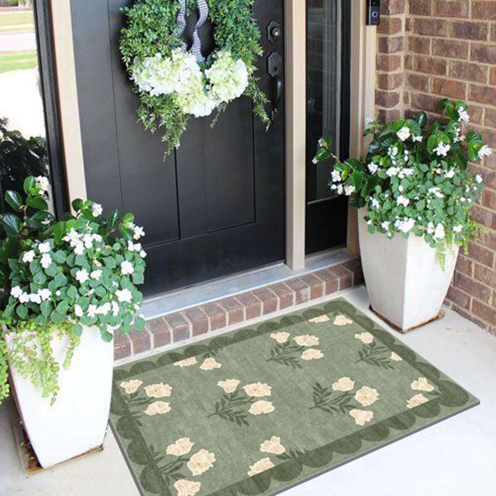 Othilic sage green floral entry rug blends with porch decor