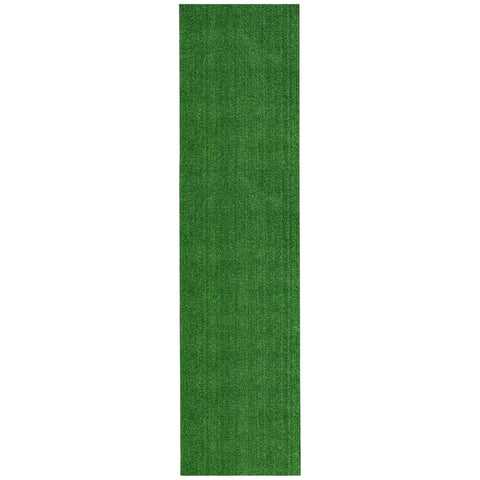 Ottomanson evergreen artificial grass runner in outdoor patio setting, durable and low profile