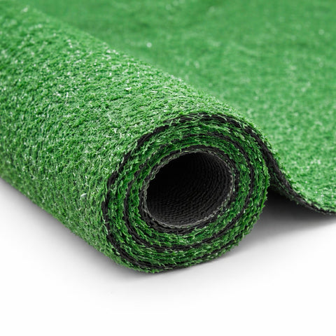 Ottomanson artificial grass rug in a spacious patio setup with drainage for outdoors