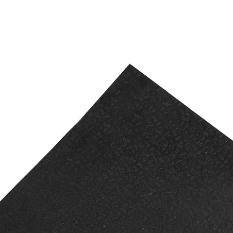 Ottomanson ridge-pattern doormat helps reduce dirt carried indoors.