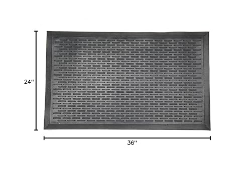 Ottomanson rubber ridge doormat for garage entry provides sturdy non-slip footing.