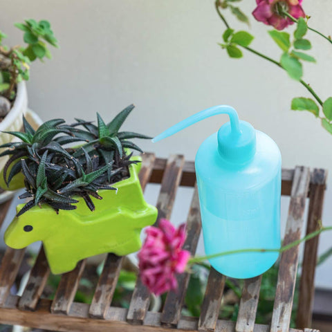 Oubest squeeze bottle blue, nozzle close-up for targeted delivery.