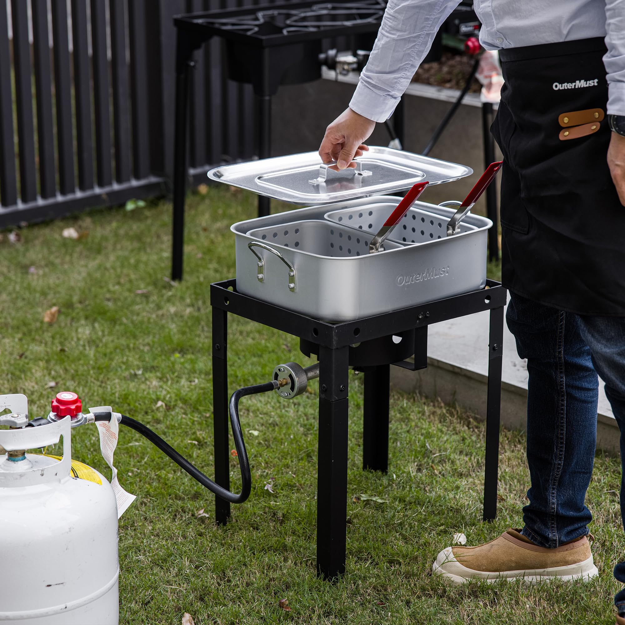 OuterMust fryer stand providing safe, stable setup on outdoor surfaces.
