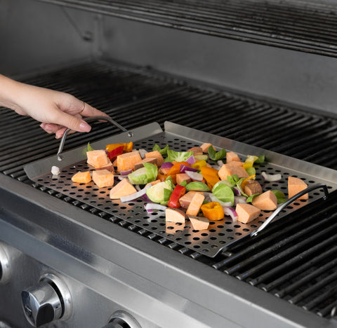 Outset perforated surface allows juices to drain into the tray
