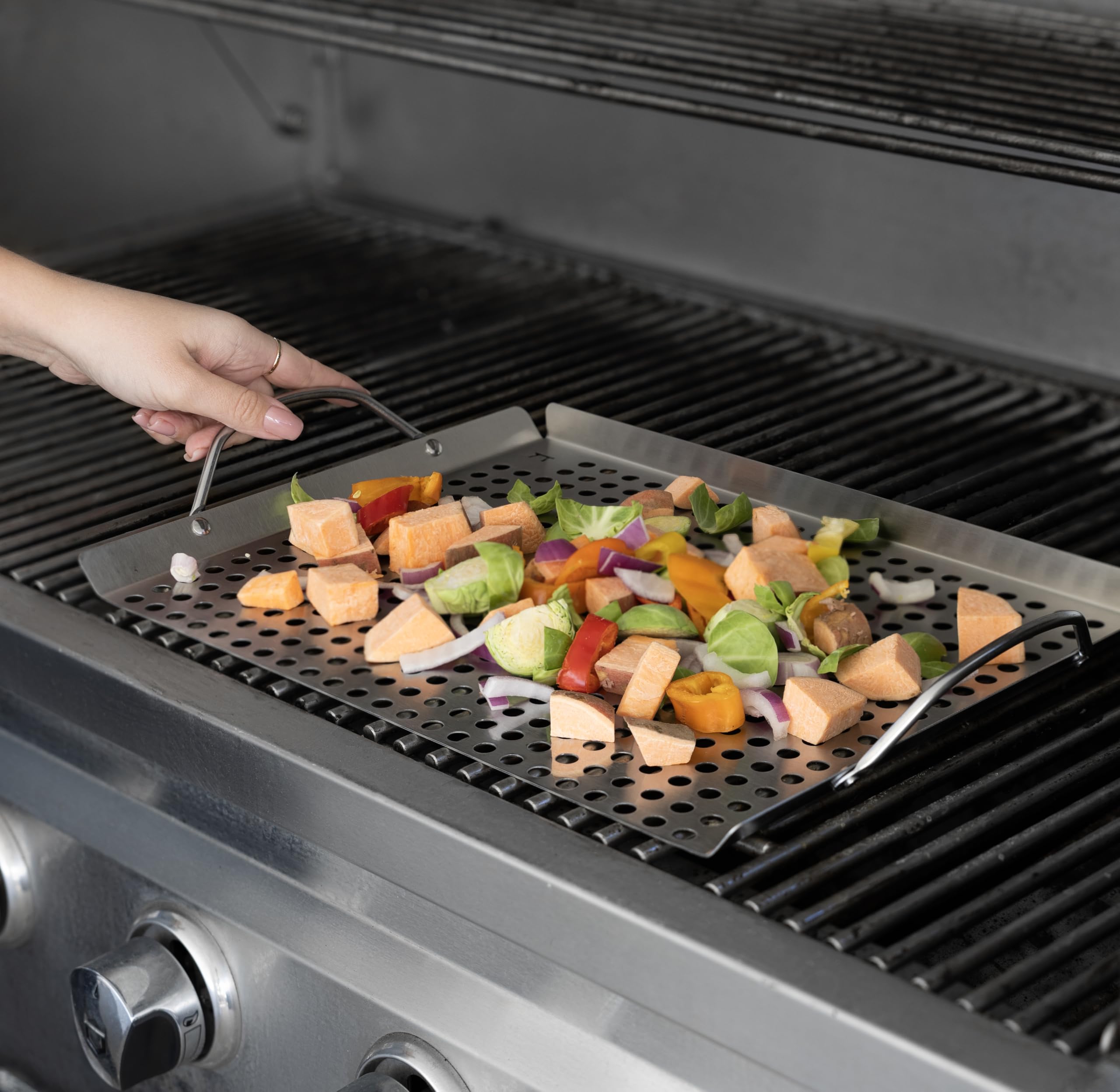 Outset grill topper grid withstands high heat for sizzle.