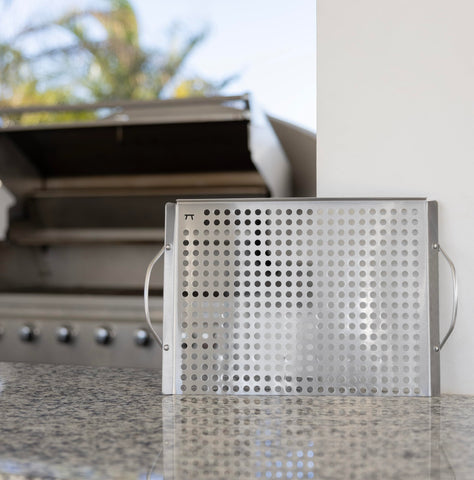 Outset grill topper grid side handles for easy lifting.