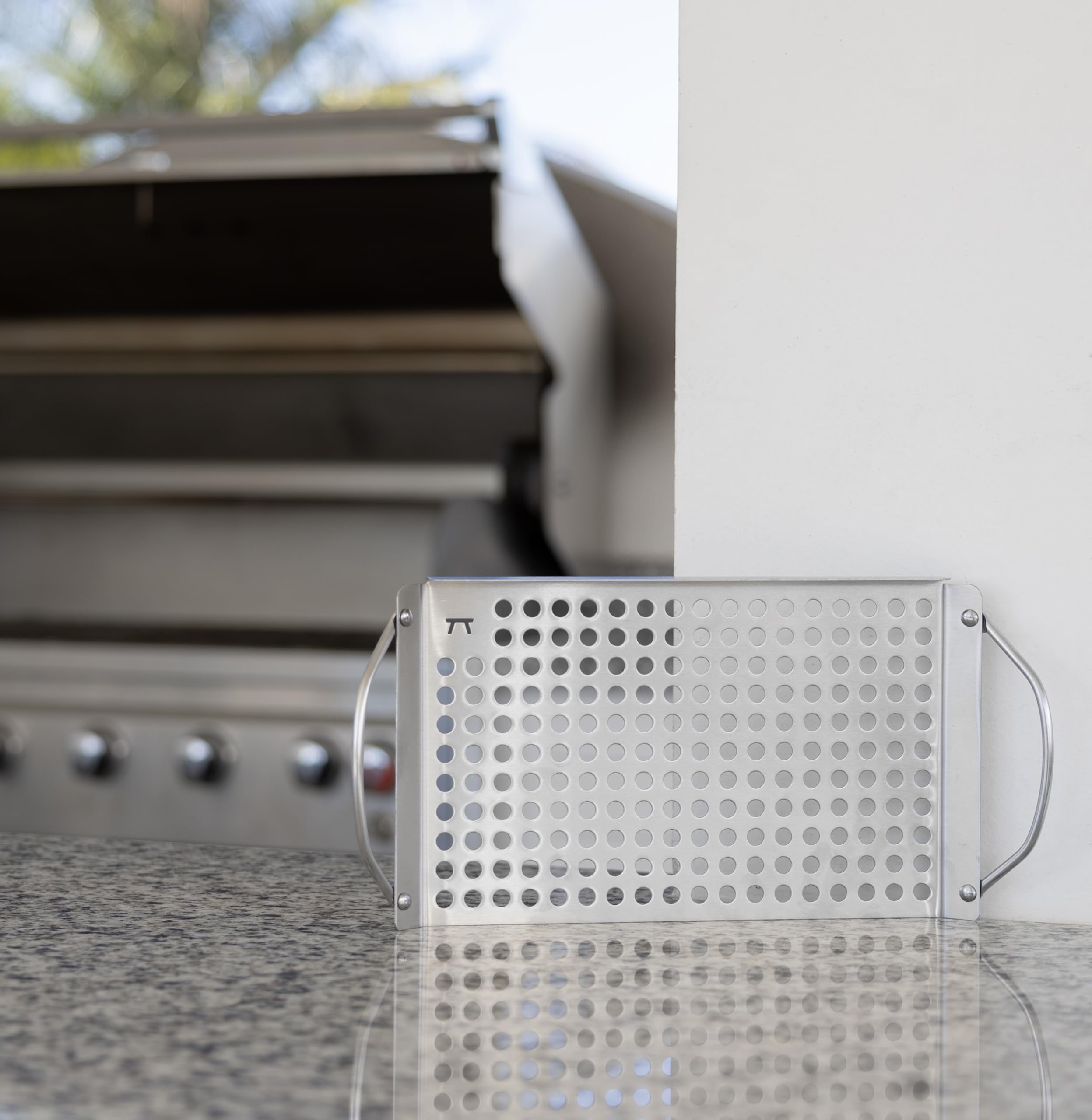 Perforated surface from Outset enables even airflow and light flavor development.